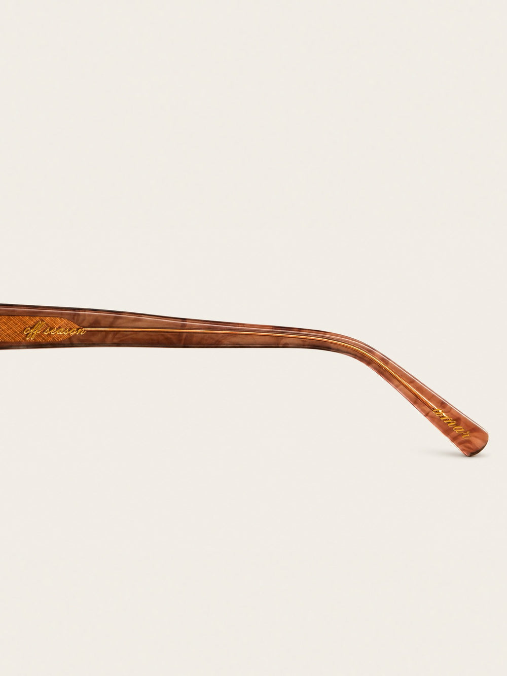 Amar rosewood swirl temple arm with engraved detail