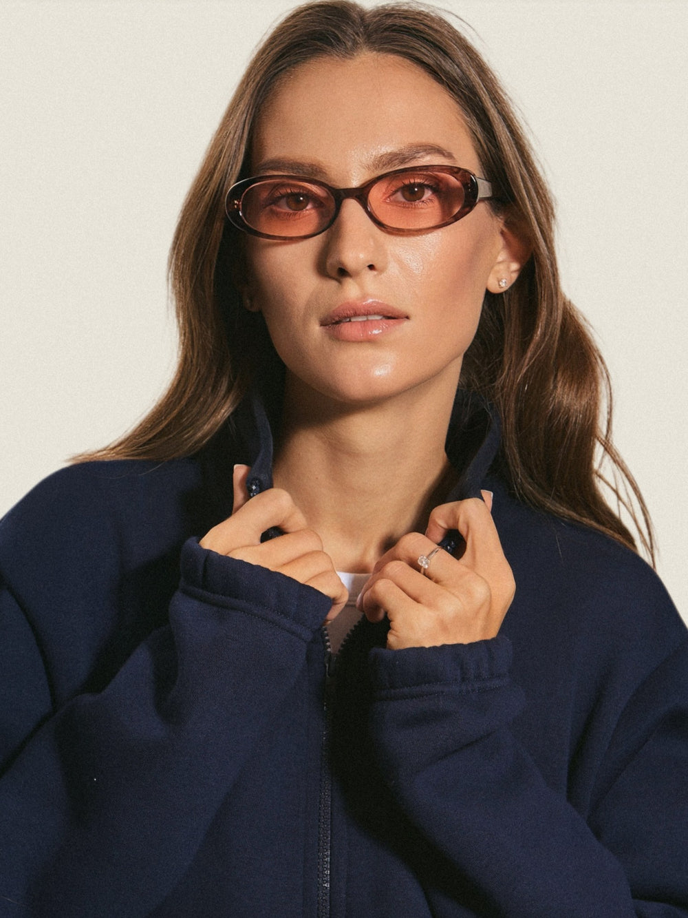 Model wearing Amar sunglasses in rosewood swirl
