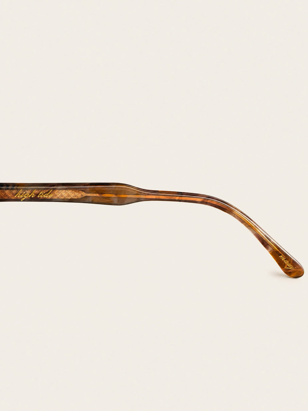 Mawj amber tortoise temple arm with engraved detail
