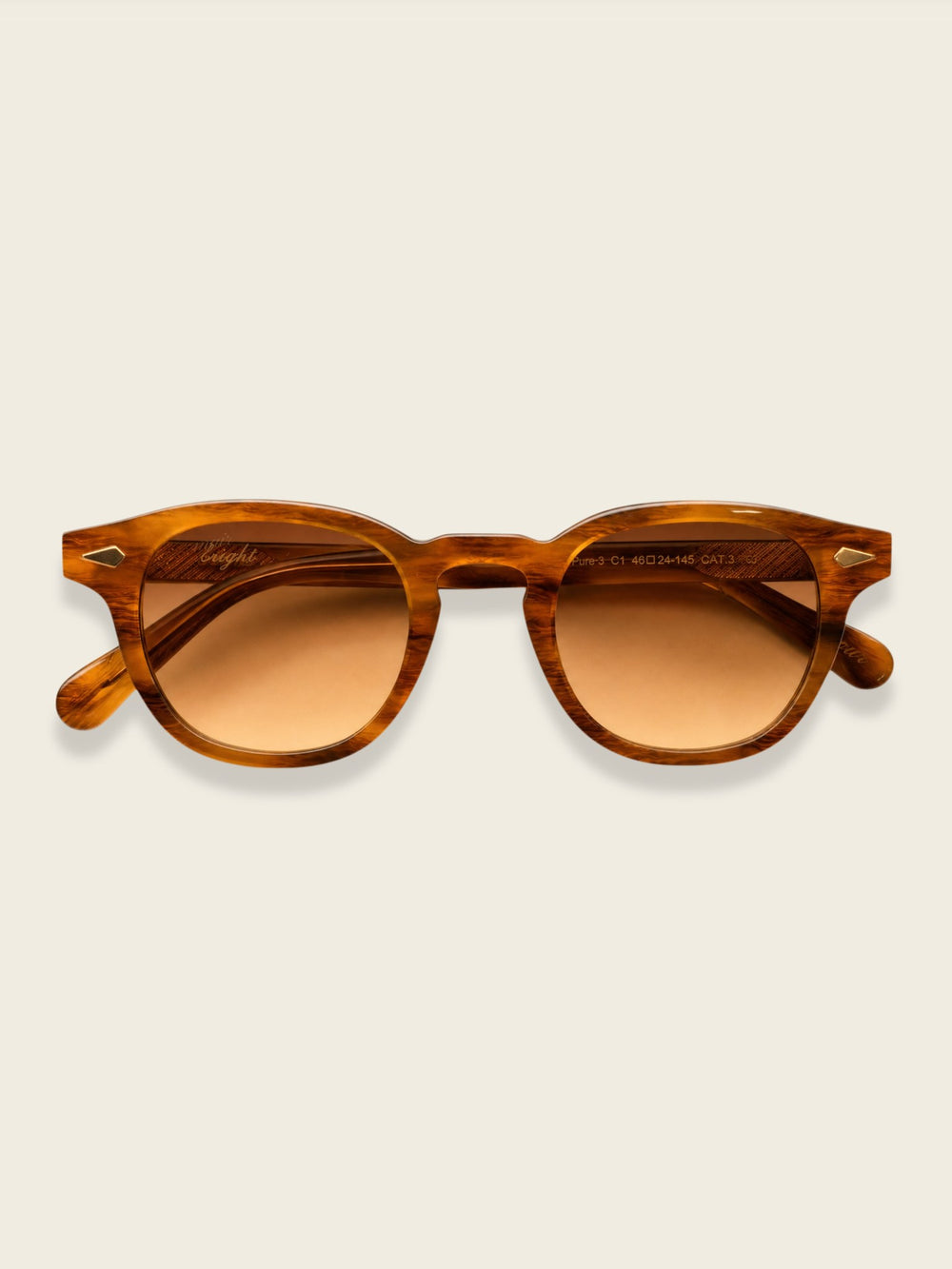 Nour round sunglasses in honey tortoise with gradient lenses, front view
