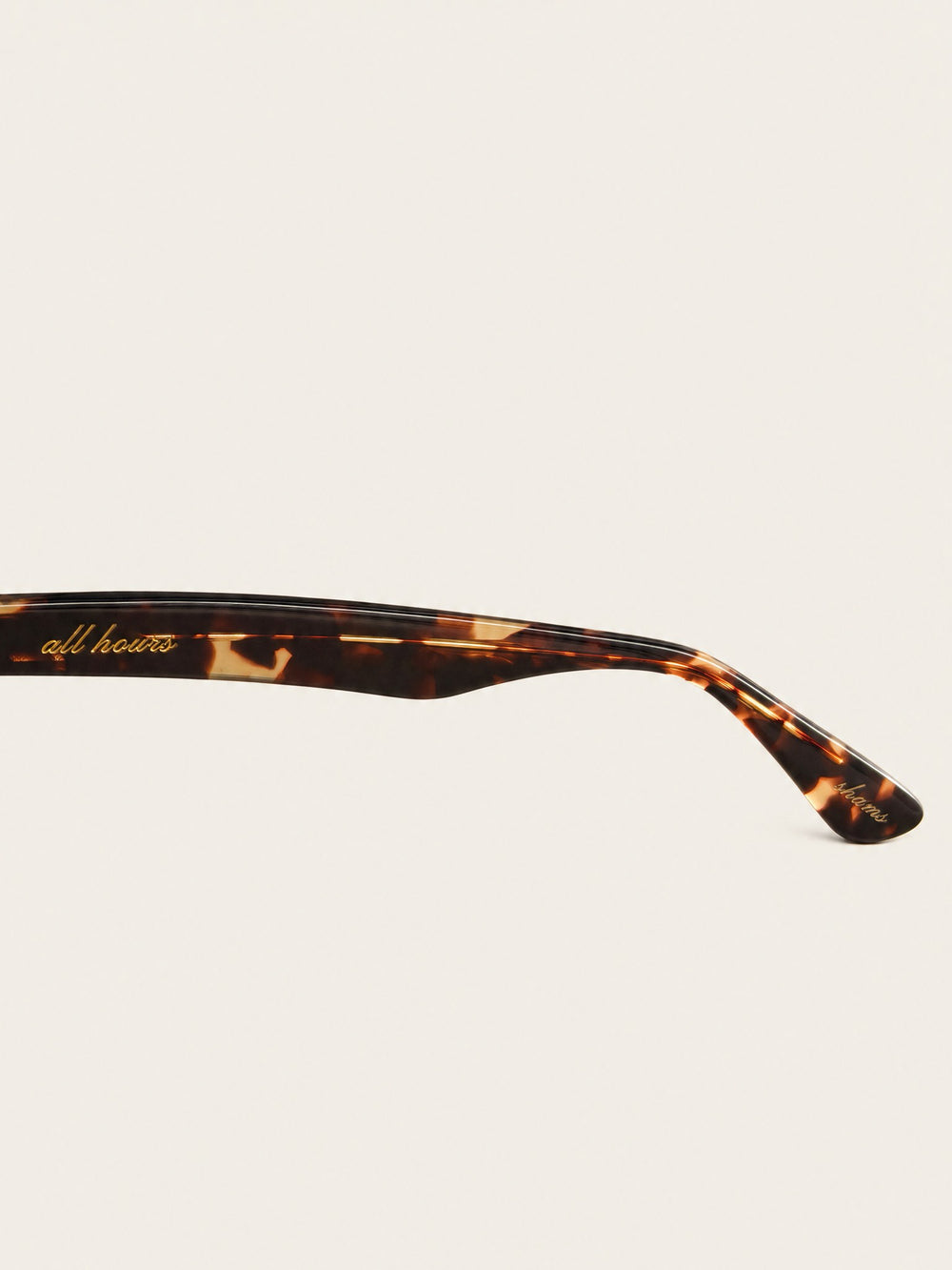 Shams dark tortoise temple arm with engraved detail